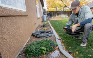 The cost of a foundation inspection depends on many factors. Here is an inspector taking a look.