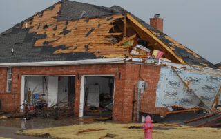 a home that has been damaged by a storm